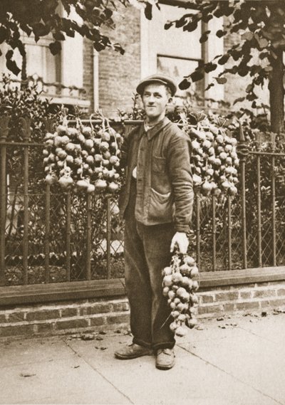A Breton onion seller with his wares, from Wonderful London, published 1926-27 by English Photographer
